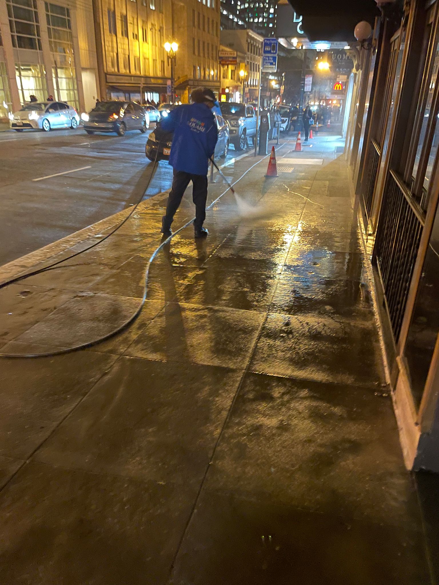 An Ambassador power washing overnight in Union Square.